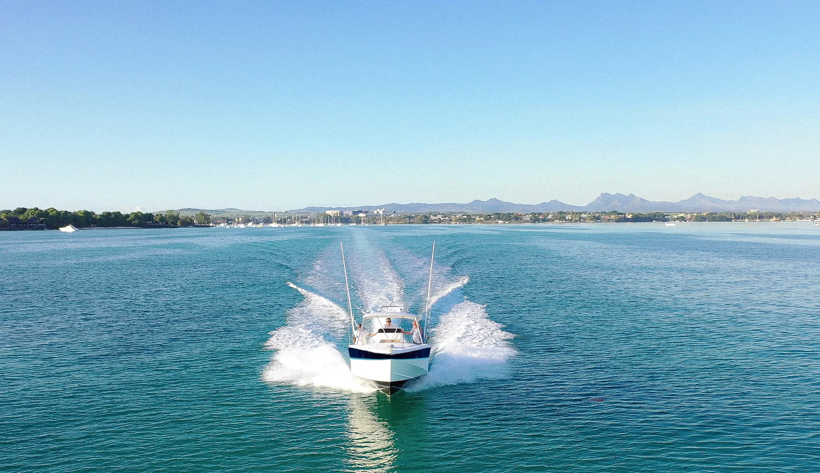 Blue Sensation speedboat on the lagoon, pictured in the activity catalogue.